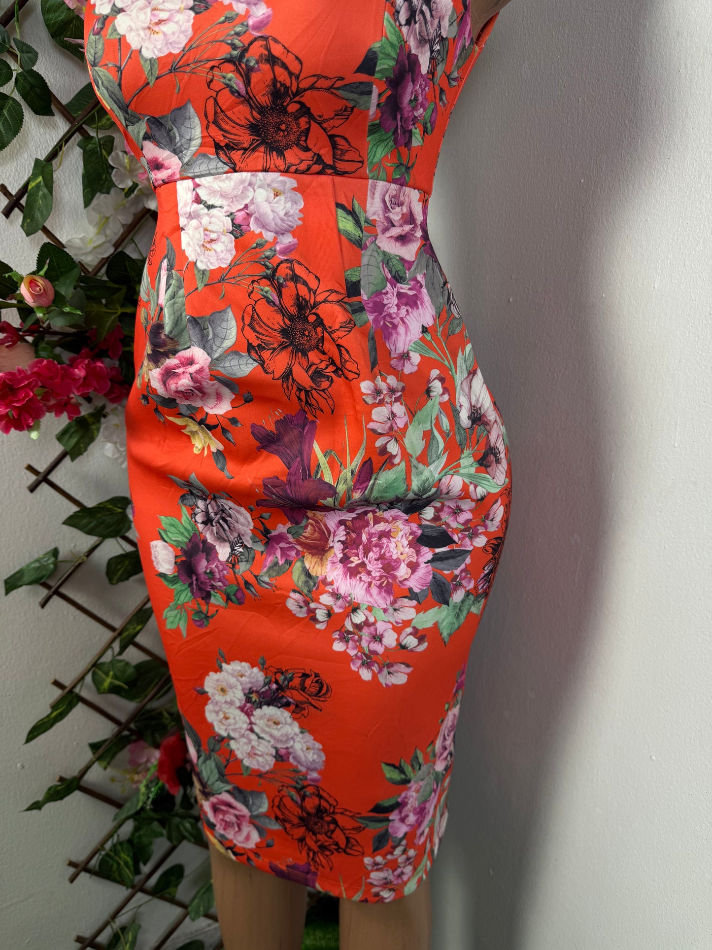 Robe moulante fleurie décolleté bateau