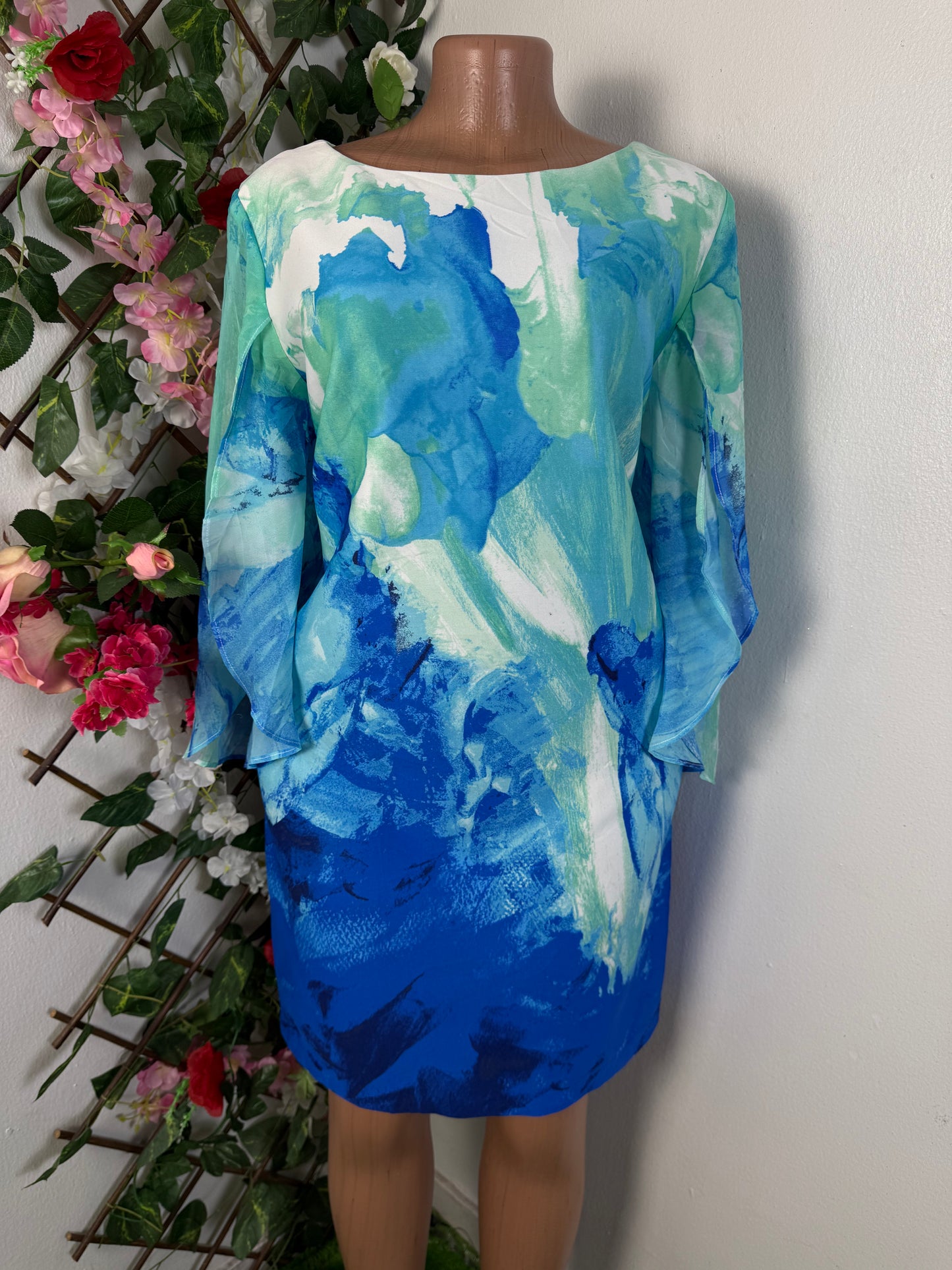 Robe mi longue manche en voile fendu