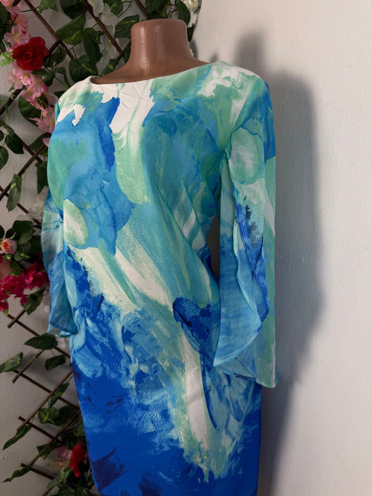 Robe mi longue manche en voile fendu
