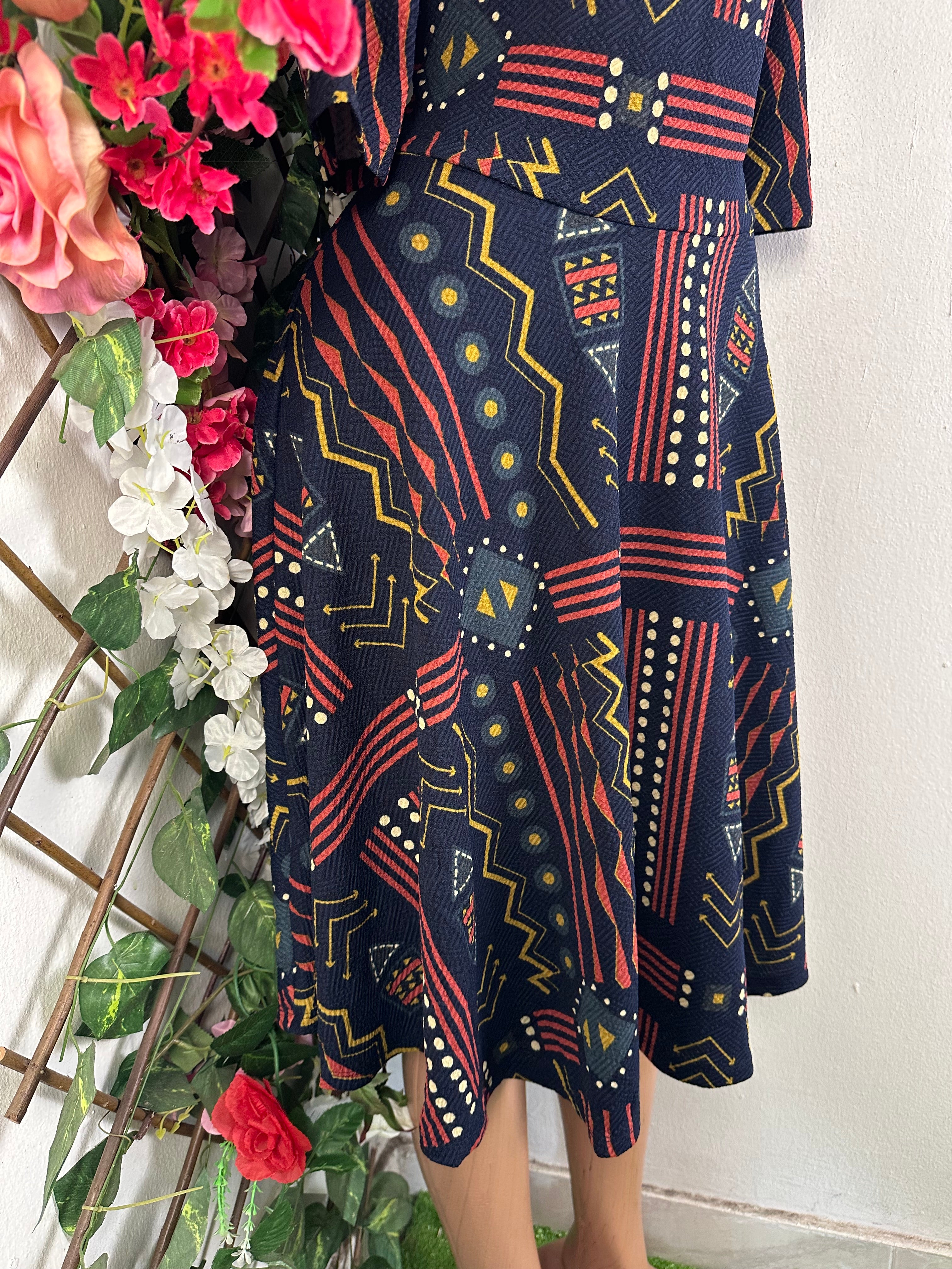 Robe évasée manches 3/4 décolletée