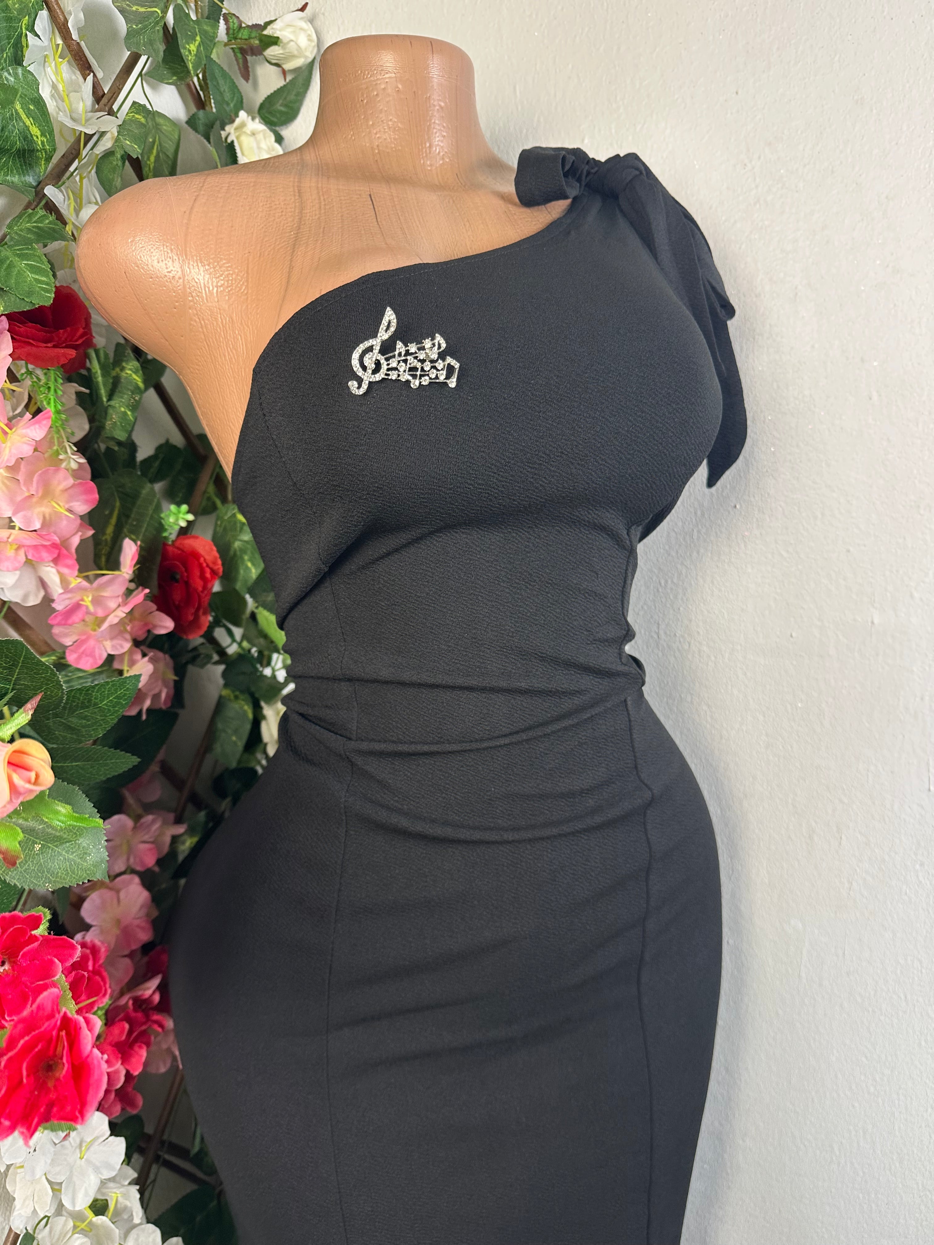 Robe moulante sans manches dénudée