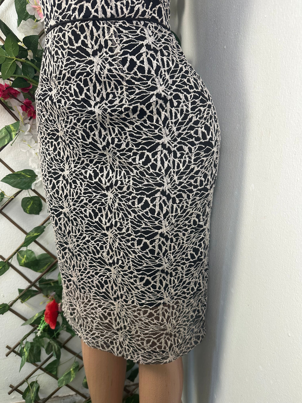 Robe moulante sans manches drapée