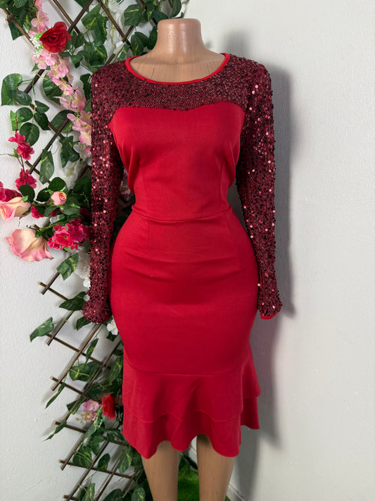 Robe mi longue évasée a longue manche en pailleté