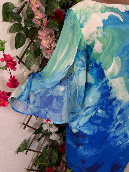 Robe mi longue manche en voile fendu