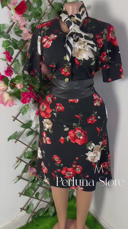 Robe midi noire avec des imprimé florale et courte manche