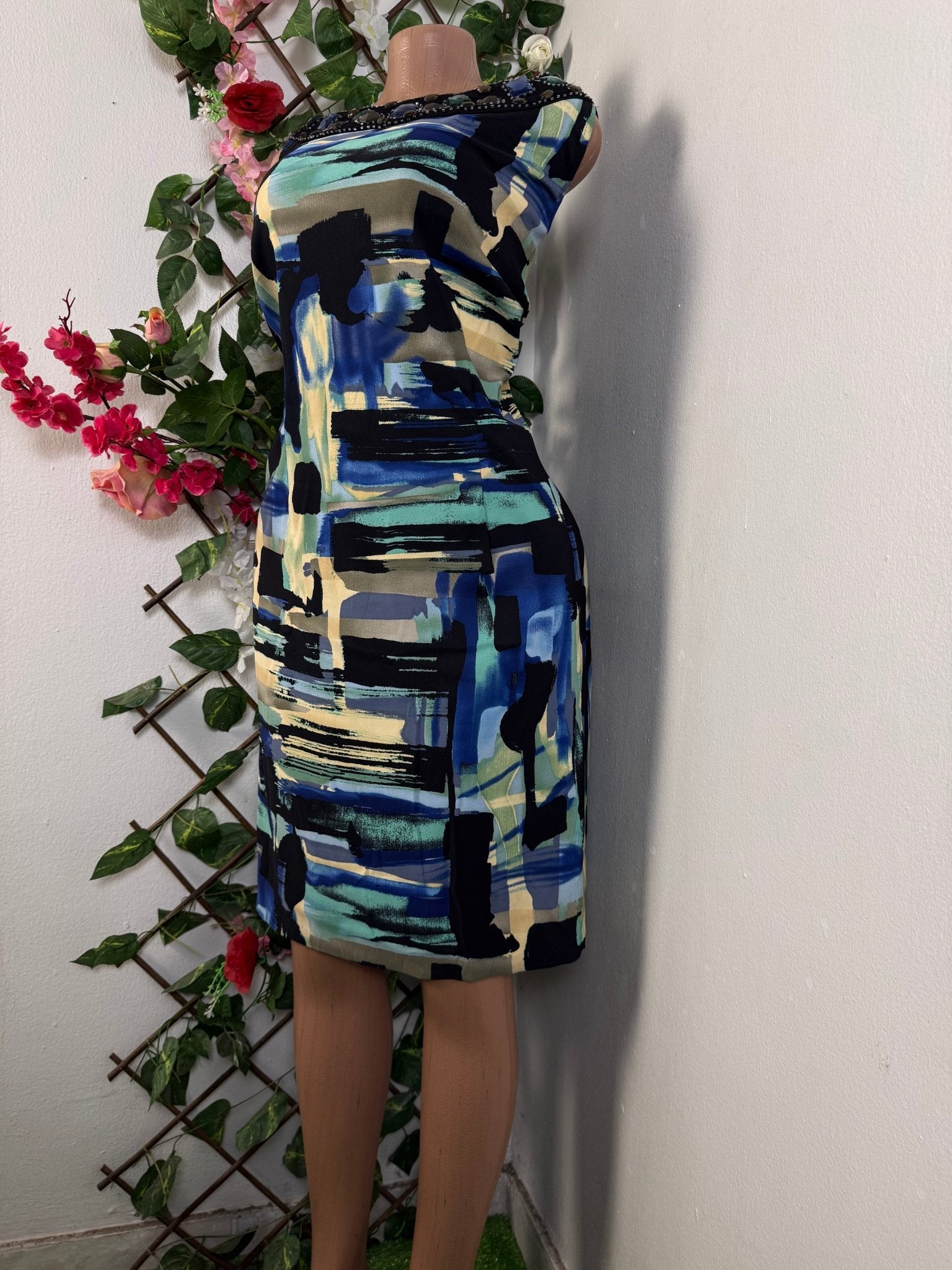 Robe élegante sans manches drapée - Perluna Store - kinshasa