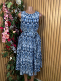 Robe évasée longue sans manches ceintré - Perluna Store