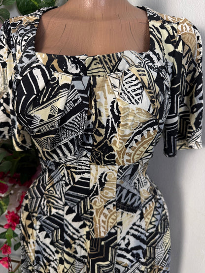 Robe mi longue évasée courte manche - Perluna Store - kinshasa